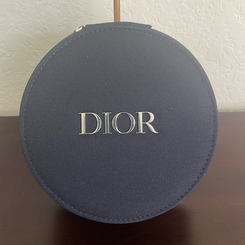 Navy DIOR round vanity mirror case.